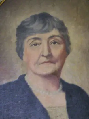 Painted portrait of Ella Hoy Goodnight with short silvering hair and a stern smile. She is wearing a pearl necklace and black suit-coat.